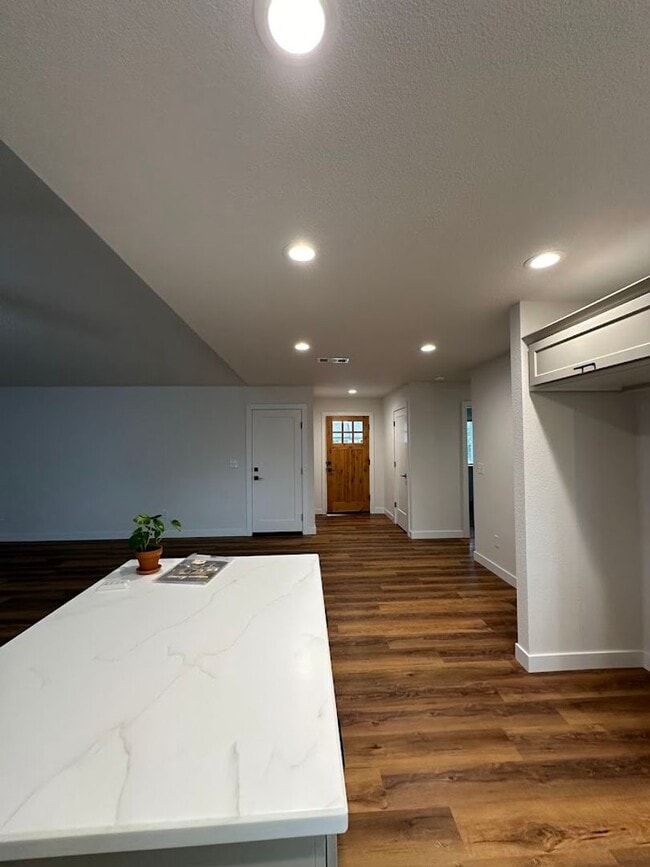 Building Photo - Updated Home with Island Kitchen, LVP Flooring, and Yard Care Included!