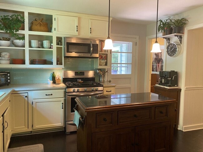 Building Photo - North AVL - Spacious Home with Large Yard and Outdoor Fireplace!