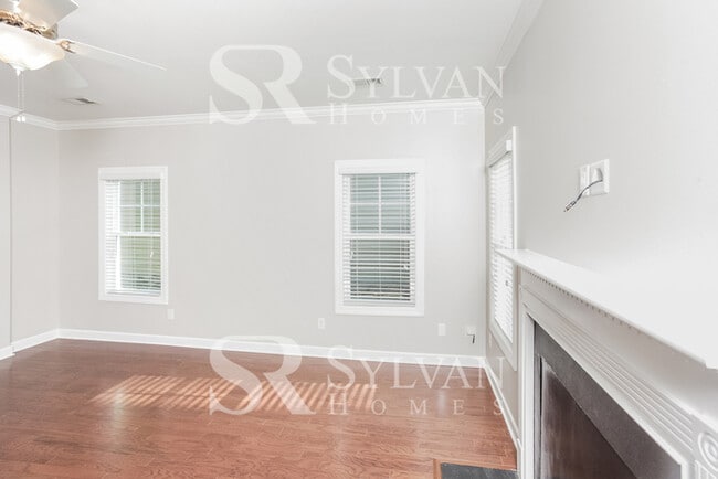 Building Photo - The living is easy in this lovely 5 bedroom, 2.5 bathroom home