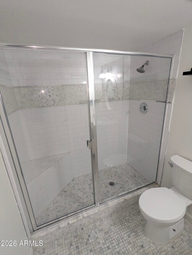 Building Photo - 7910 E Camelback Rd