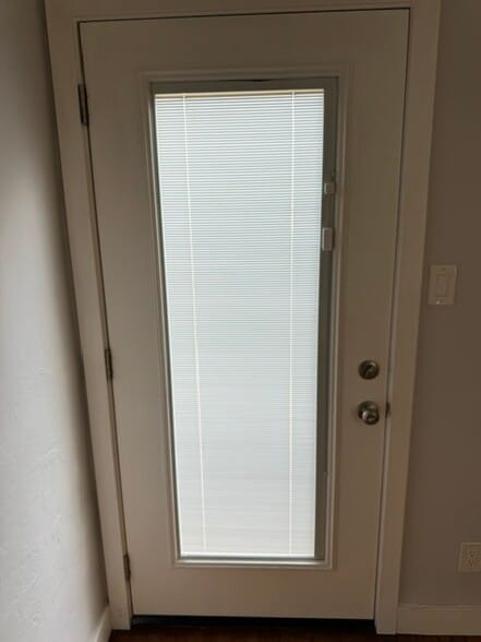 Backdoor with enclosed blind - 226 N Brighton St