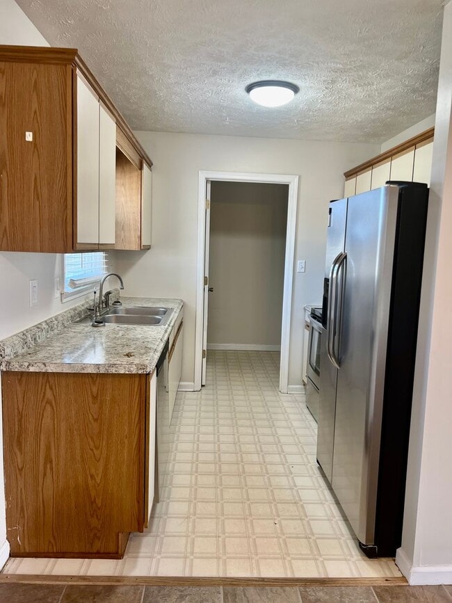 Building Photo - AVAILABLE NOW! 3 Bedroom, 2 Bath Home off Needmore Road