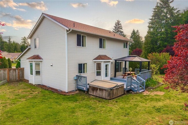 Building Photo - Enjoy this 3 bedroom, 2.5 bath home in the gated community of Stonerise