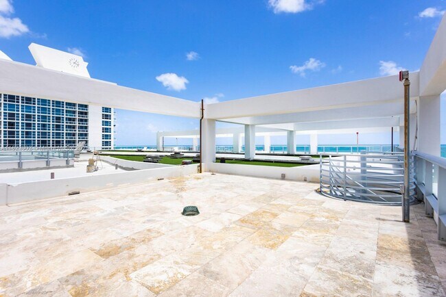 Building Photo - 6799 Collins Ave