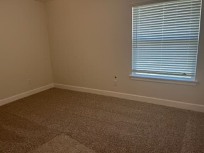 Building Photo - First Month Free!  BRAND NEW HOME