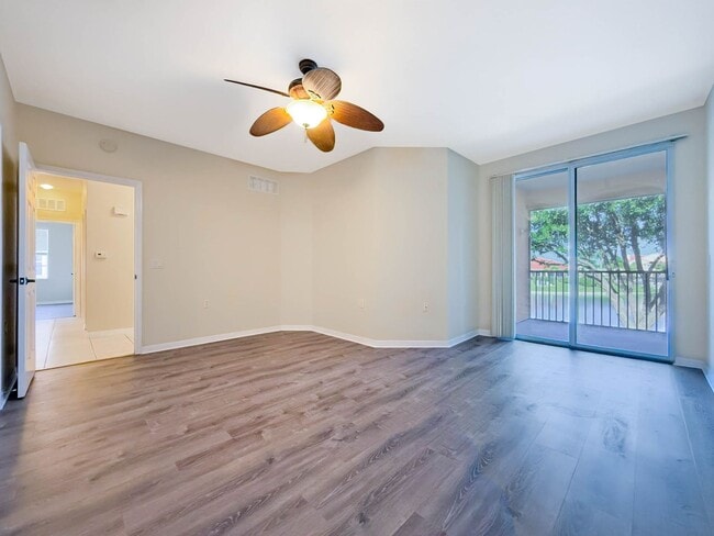 Building Photo - Beautiful 3-Bedroom Condo with 2-Car Garag...