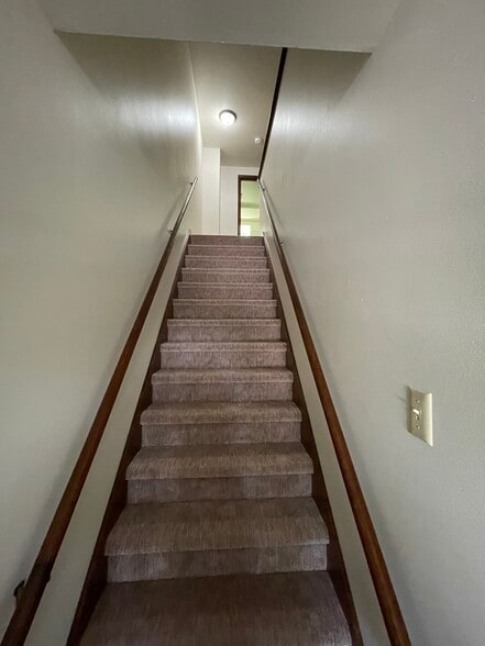 Stairs to upper level - 1409 Wiesner St