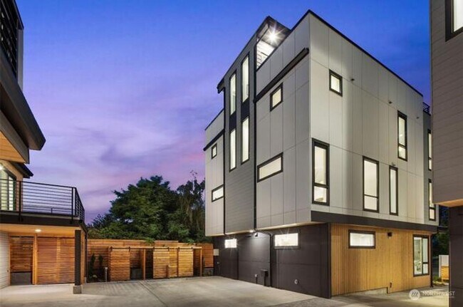 Building Photo - Welcome Home -Modern and Expansive Windows