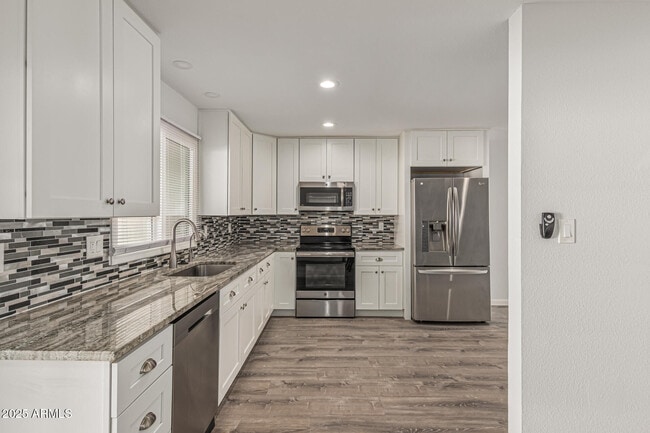 Building Photo - 7714 E Wilshire Dr