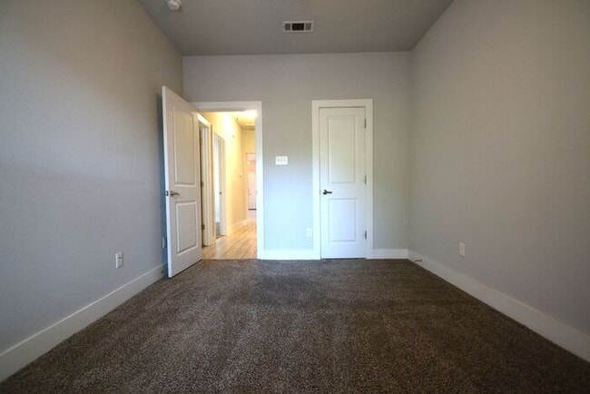 Building Photo - COMING SOON! Modern 3BR/2BA Duplex with 2-Car Garage & Fenced Yard — Fort Worth, TX | Pet Friendly