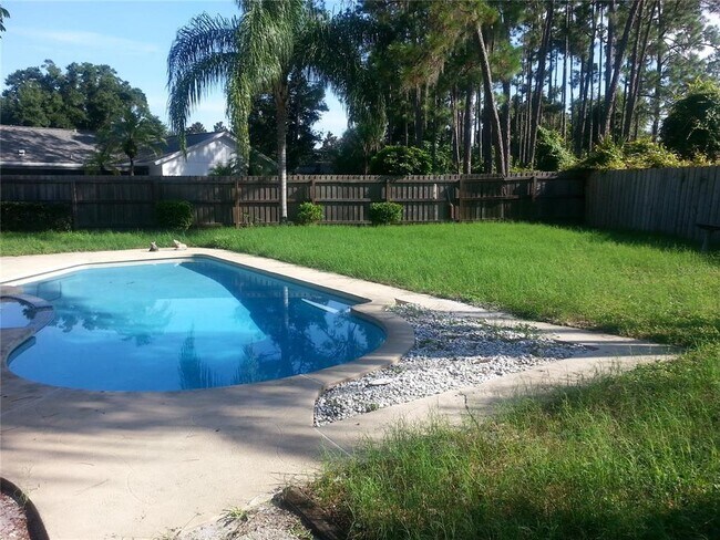 Building Photo - 9149 Palm Tree Dr