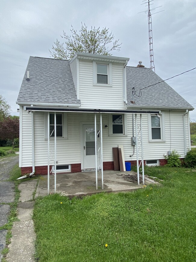 Back view, including awning and patio! - 128 Standish Dr