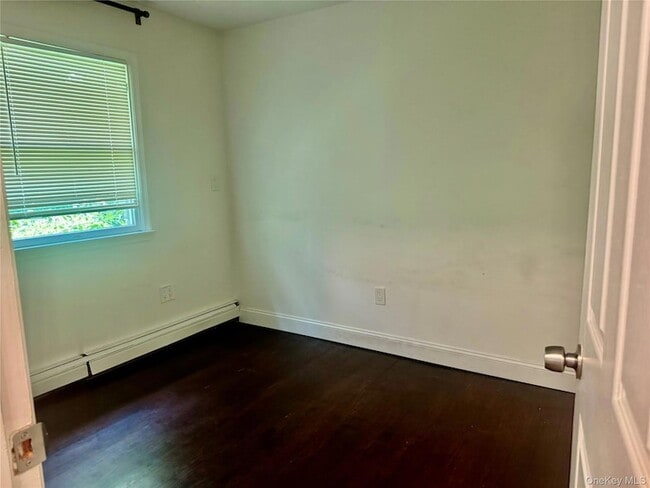 Building Photo - 15649 76th St Unit 2