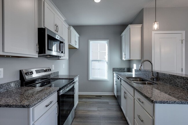 Building Photo - 1 Year of FREE Alarm Monitoring! 3 Bedroom with 2 Baths!