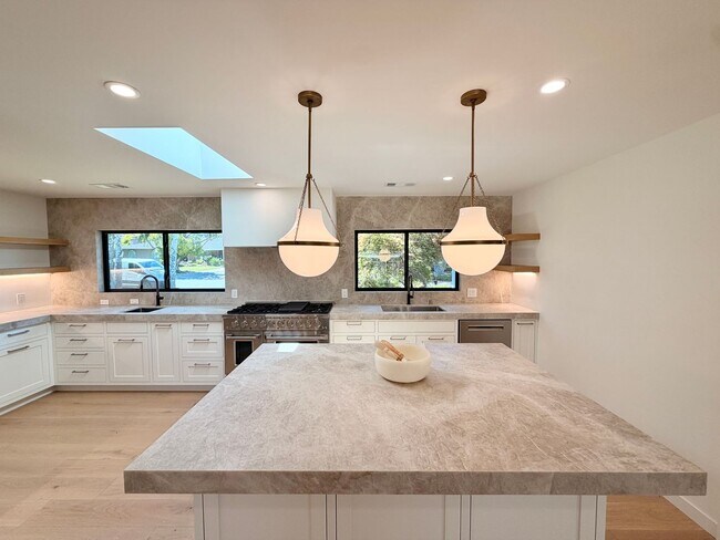 Building Photo - This premier 4-bed, 3-bath estate spans 2,565 sq. ft. on a 10,253 sq. ft. lot in North Los Altos.