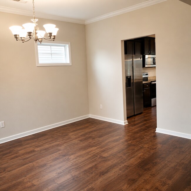 Building Photo - 4BR Home with Community Pool & Modern Finishes!