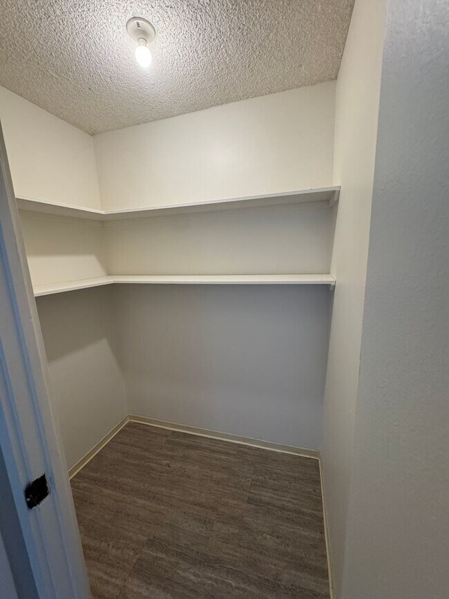 Building Photo - Large 2/2 Waikiki Condo with Parking, Lanai, A/C & W/D in unit!