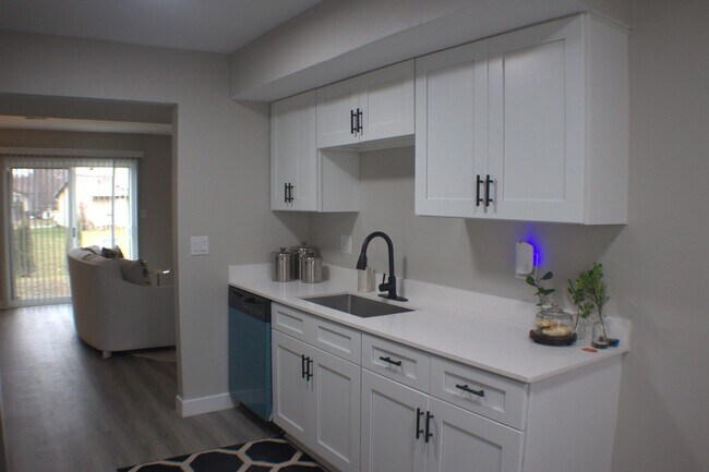 Building Photo - Renovated 2-Bedroom, 1.5-Bathroom Condo in South Bend – $1,435/Month – Accepting Section 8 (Lawn ...