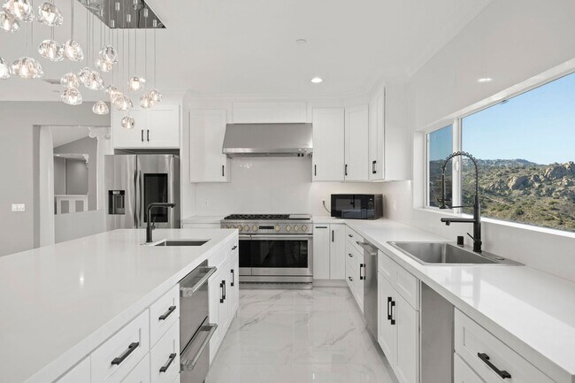 Building Photo - Modern Elegance Meets Scenic Privacy in Be...