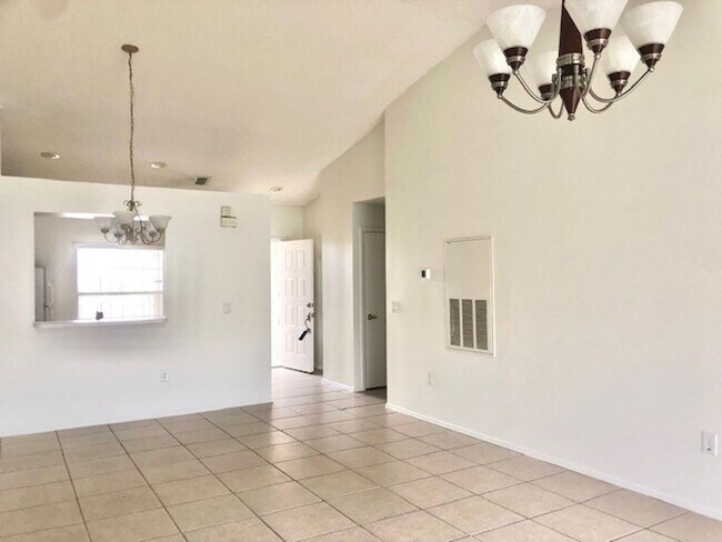Building Photo - Nice 2X2 located on 2nd floor- Tile & laminate flooring! NO CARPET! Call today!! Tranquil water v...