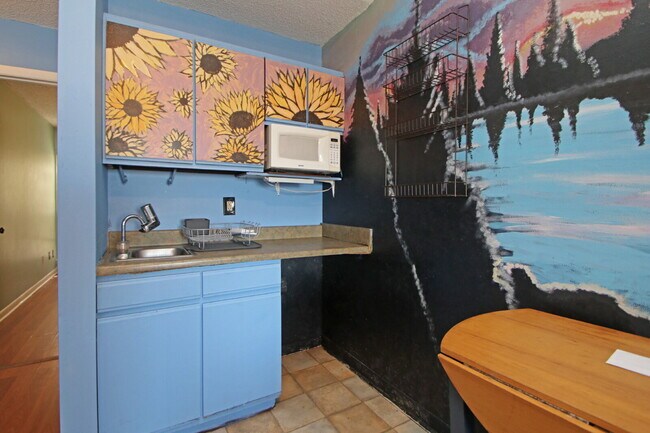 Building Photo - "Rent a room in this 4-Bedroom Furnished T...