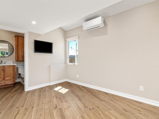 Building Photo - Studio with Loft, Private Patio, and All U...