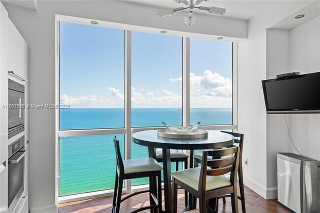 Building Photo - 18201 Collins Ave