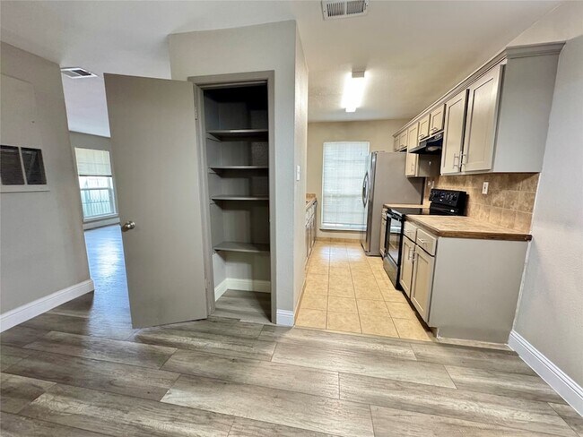 Building Photo - 5981 Arapaho Rd