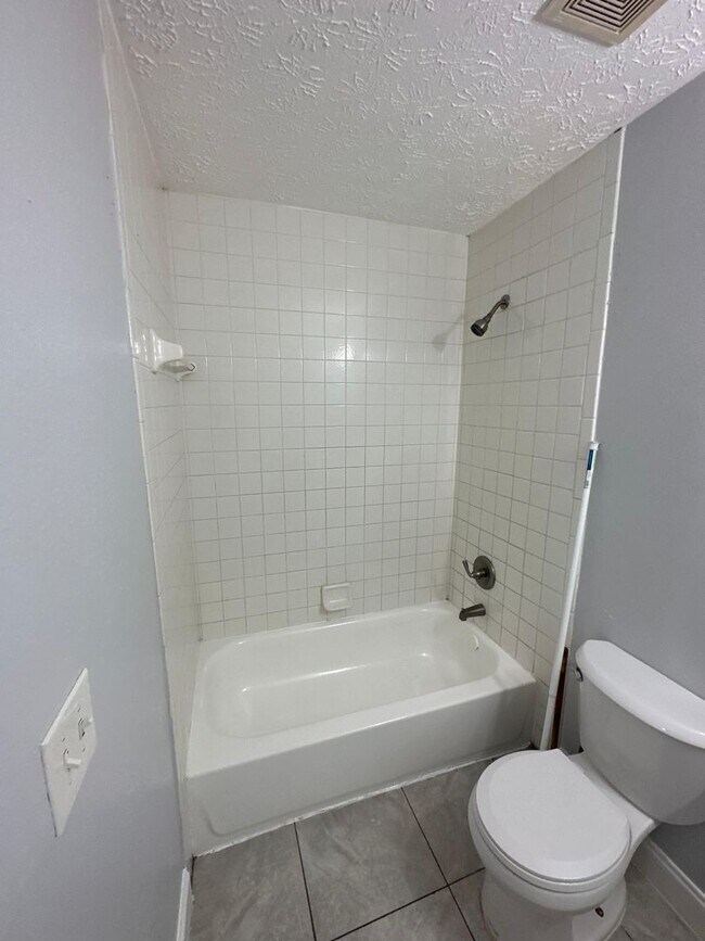 Building Photo - Fully Renovated 3/1.5 -Single Family! Avai...