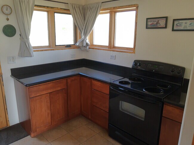 Kitchen cabinets & stove - 114 Aldasoro Rd