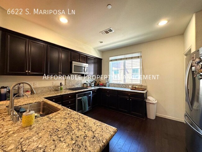 Building Photo - 6622 S Mariposa Ln
