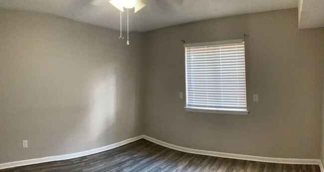 Building Photo - Just off the main road, but in walking dis...