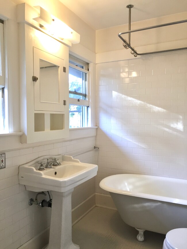 bathroom with bathtub - 3512 Pershing Ave