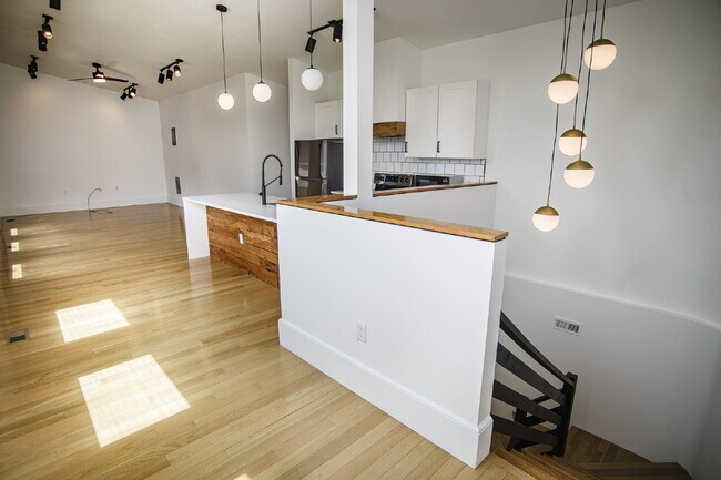 Building Photo - August Only: Submit your application this month and pay a reduced application fee of just $32. Ch...