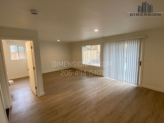 Building Photo - Stylishly Renovated Home with Private Back...
