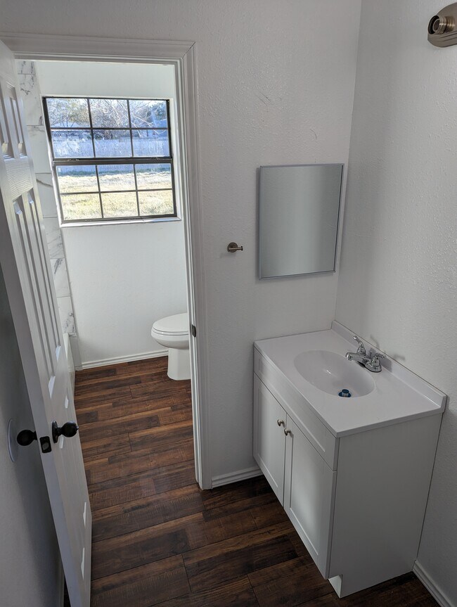 hall full bath - 107 W Mesquite St