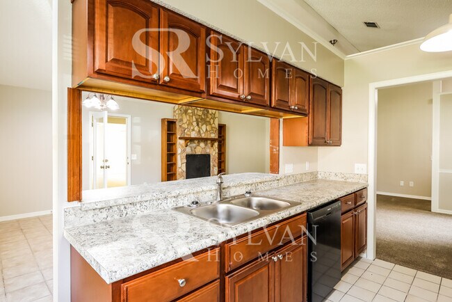 Building Photo - The living is easy in this 4 bedroom, 2 bathroom home