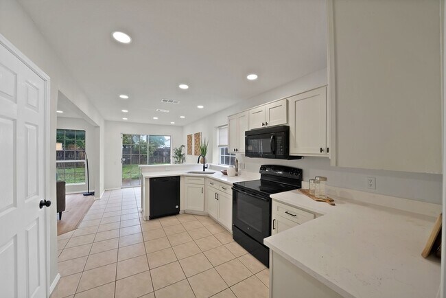 Building Photo - 7548 Meadow Creek Dr