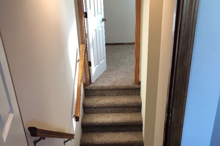 Stairs between bedrooms - 13305 Discovery Dr