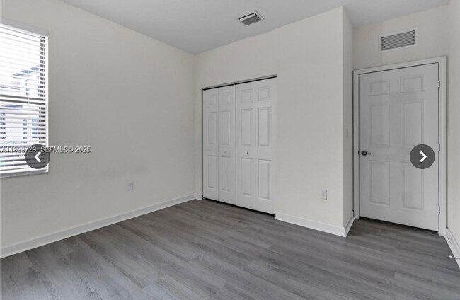 Building Photo - 10091 W 35th Ln