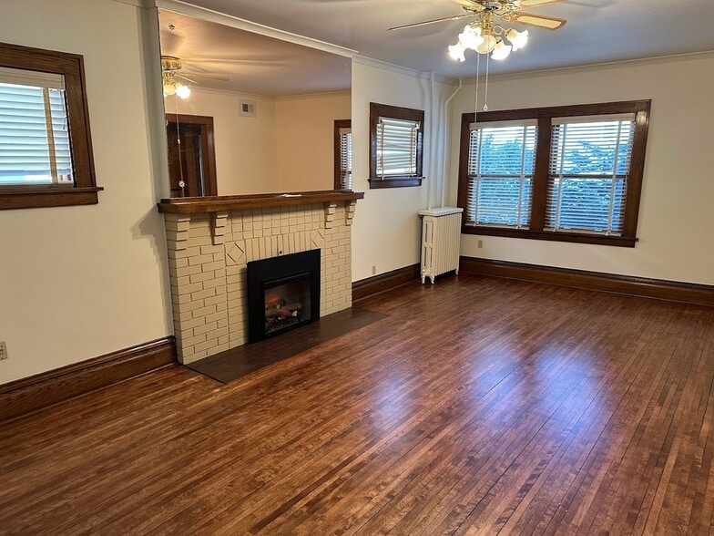 Large living room with electric fireplace - 705 2nd St NW