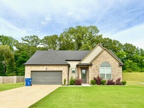 Building Photo - Coming soon for Rental in May - beautiful 4 BR 2.5bath house in a New Horn Lake neighborhood