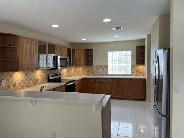 Building Photo - 5605 Rambler Rose Way