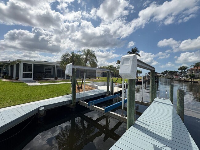 Building Photo - Beautifully Furnished Pool Home with Boat ...