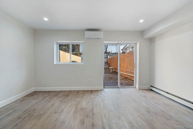 Building Photo - 42-27 214th Pl