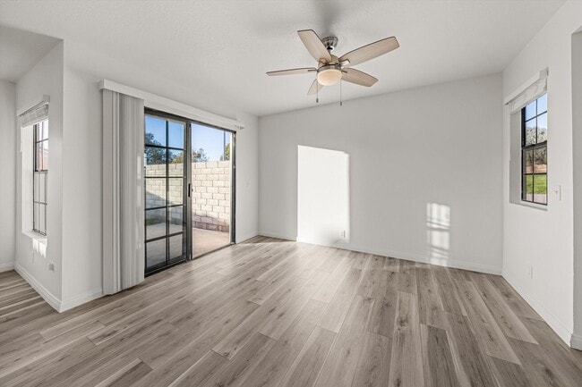 Building Photo - Large Renovated 3bed x 2.5bath Townhouse with Private Patio & 2-Car Garage