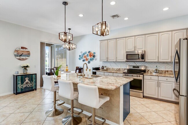 Building Photo - ** REFLECTION LAKES ** 4 BED / 2 BATH - PO...
