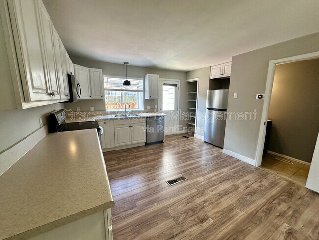 Building Photo - 9616 W Chatfield Ave