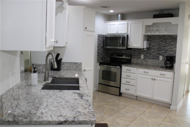 Building Photo - 7655 Cardiff Ct N