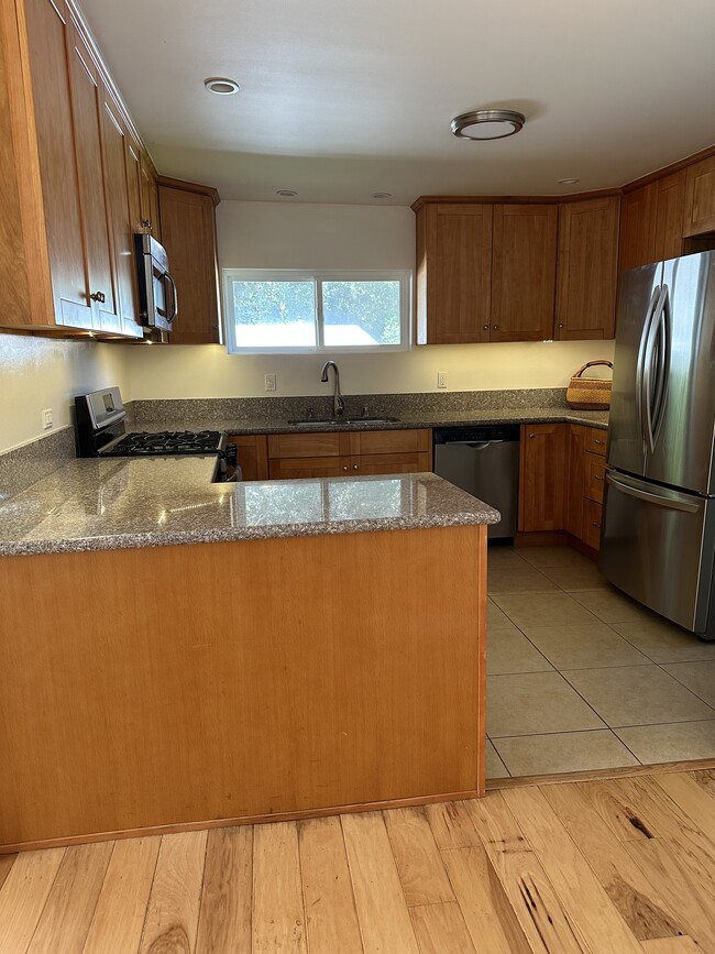 View of kitchen, showing under cabinet lighting - 19876 Observation Dr